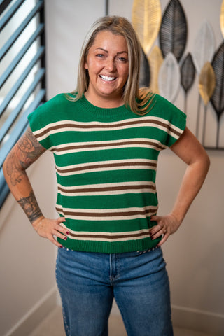 Green striped knit vest with brown and cream horizontal stripes, structured shoulders