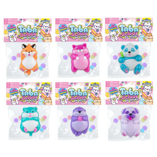 Set of six packages of Taba-licious plush toys with colorful packaging.