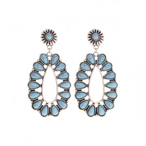 Pair of blue teardrop earrings with silver accents on a white background