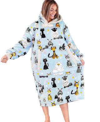 Woman wearing oversized light blue Lazyone Cats Blanket Hoodie with cartoon cat print