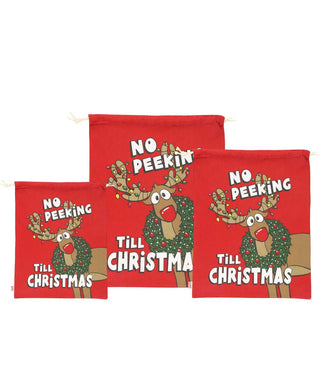 Three red cotton drawstring bags with reindeer and No Peeking Till Christmas print