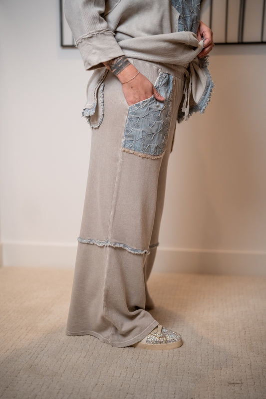 Side view Starlight washed terry pants in light ash with wide leg fit and frayed seam details by Easel
