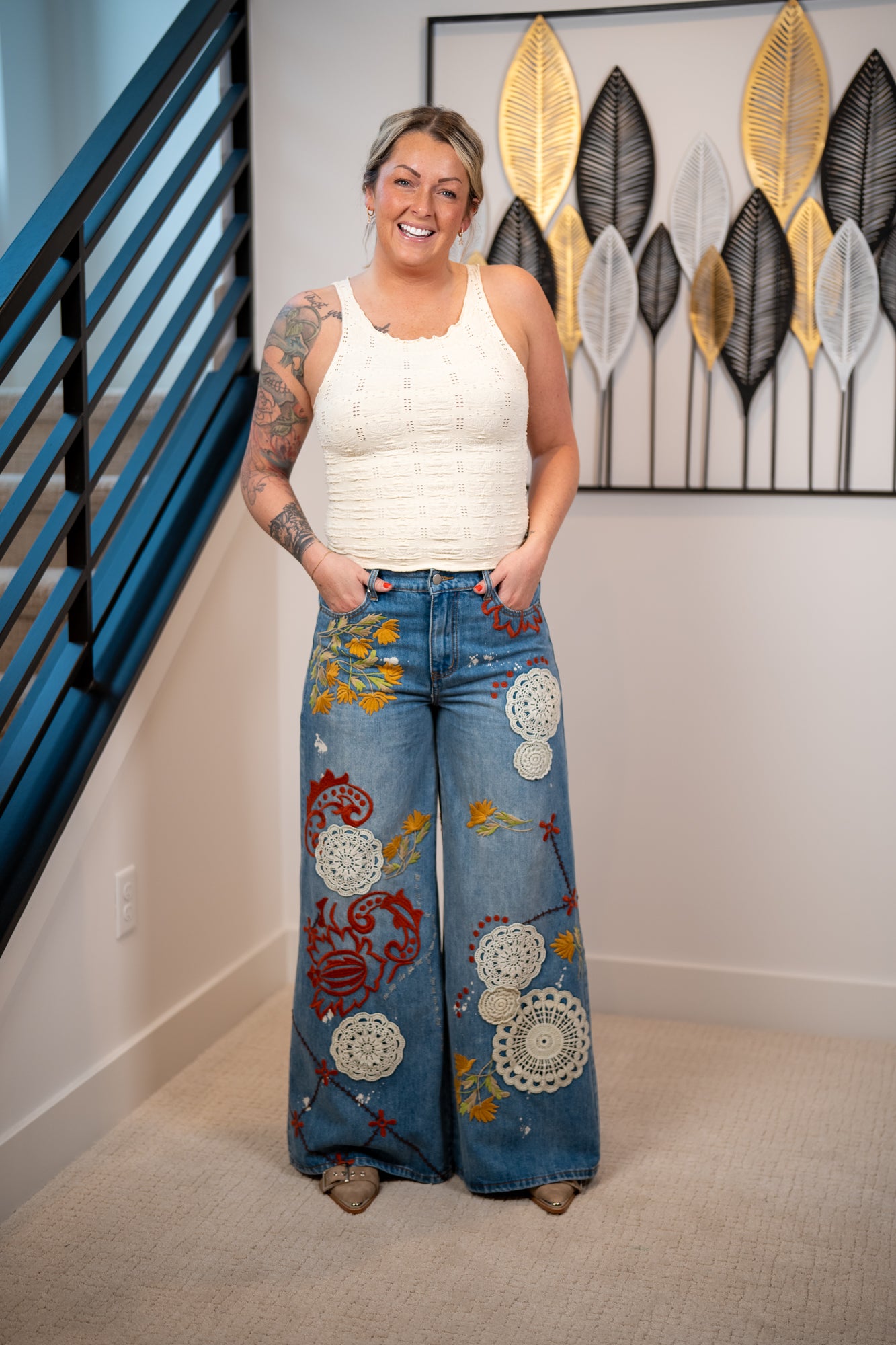 Oli and Hali wide leg embroidered denim jeans with floral stitching and lace patchwork in medium wash