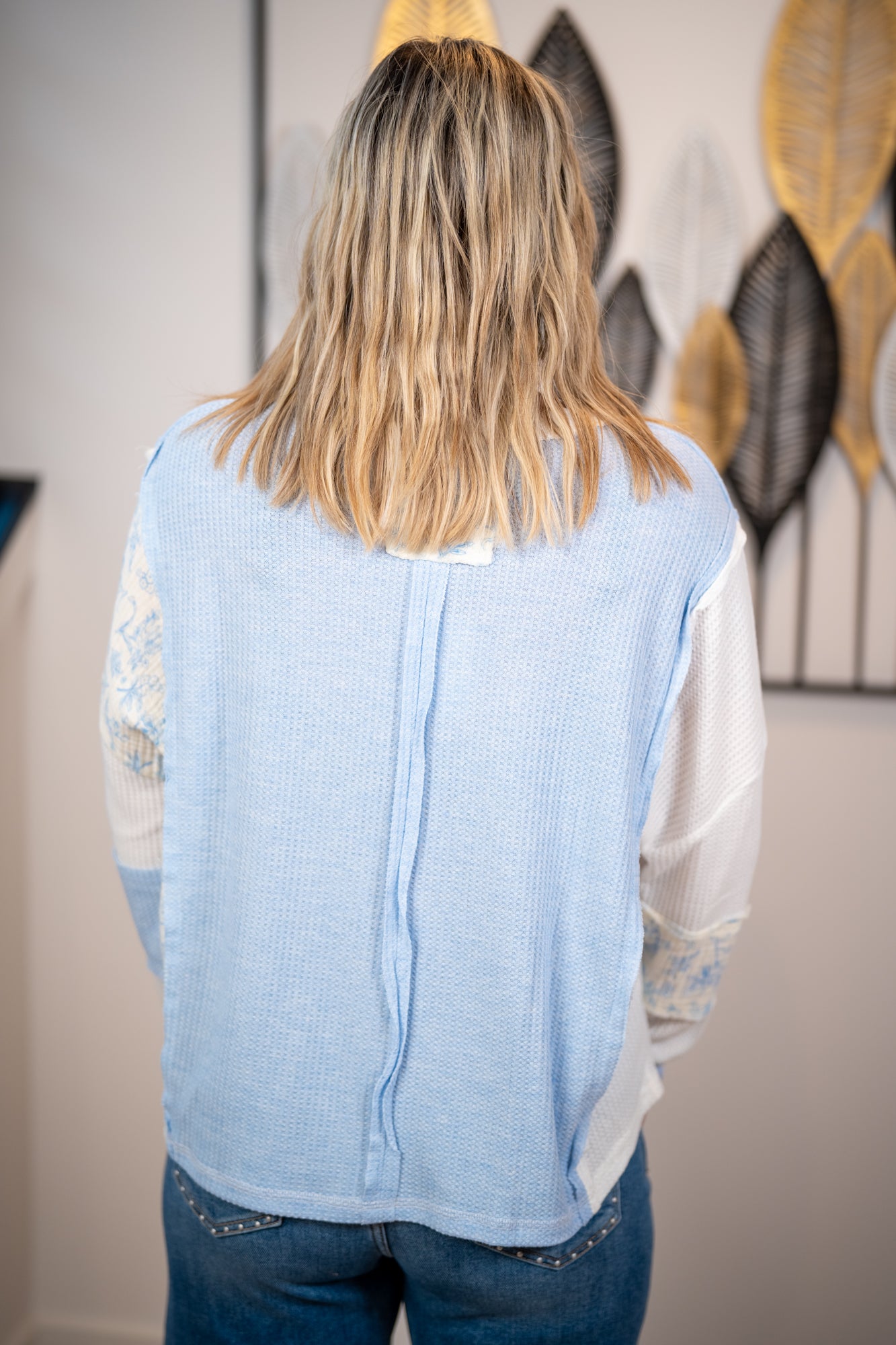 Blue waffle knit top back view
