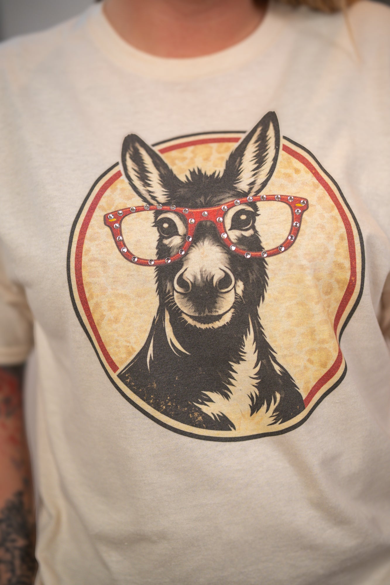 Playful Charm Donkey Rhinestone Specs Graphic Tee – Natural