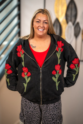 Black zip-up hoodie with red rose embroidery on front and sleeves