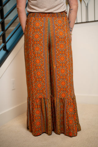 Easel Smocked Waist Ruffle-Hem Pants - Buttercup Lynne Boutique