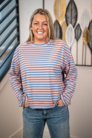 Pink and blue striped long sleeve boyfriend tee worn with jeans