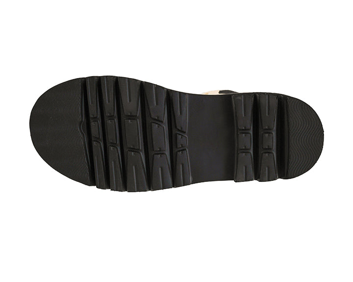 Corkys Drizzle ivory waterproof ankle boots bottom tread view with chunky black lug sole