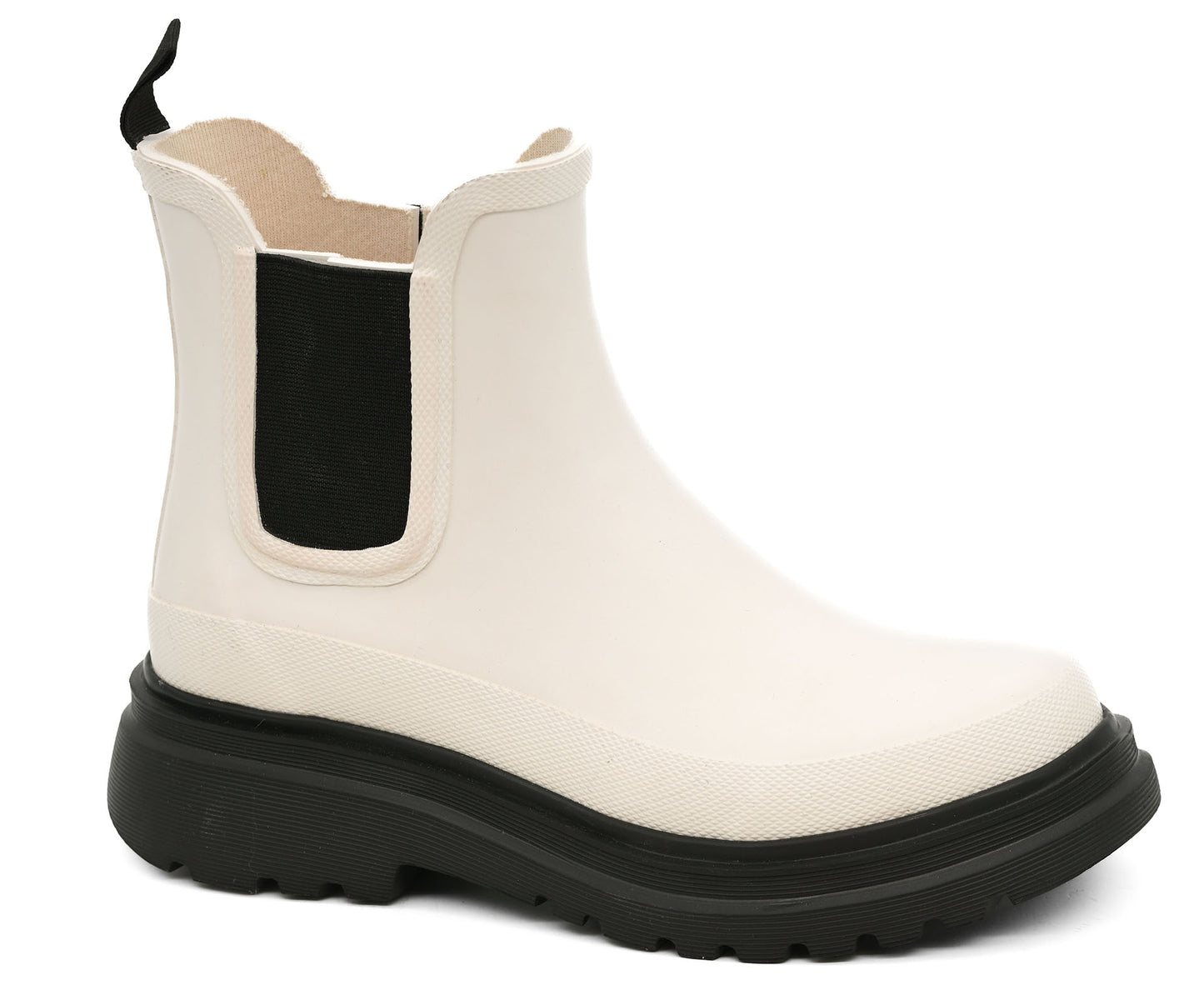 Corkys Drizzle ivory waterproof ankle boots with black lug sole and elastic side panels