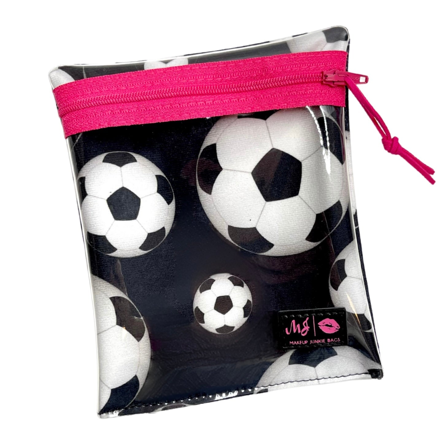 Clear pouch with pink zipper containing soccer ball designs on a white background