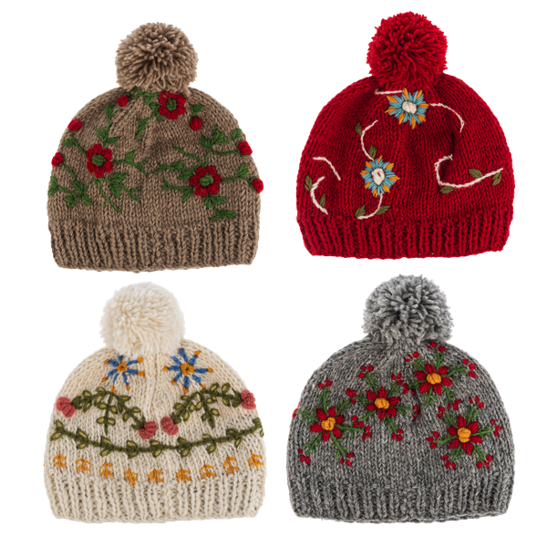 ganz Four knitted hats with floral patterns and pom-poms on a white background