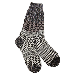 Black and white Fair Isle patterned knit crew socks with textured cuff