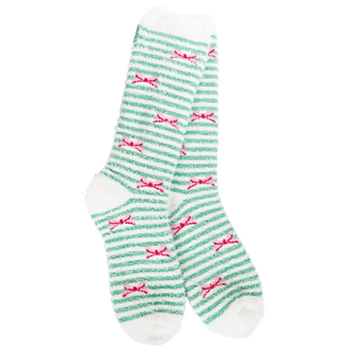 Fuzzy crew socks with green stripes and scattered red holiday bow patterns on white background