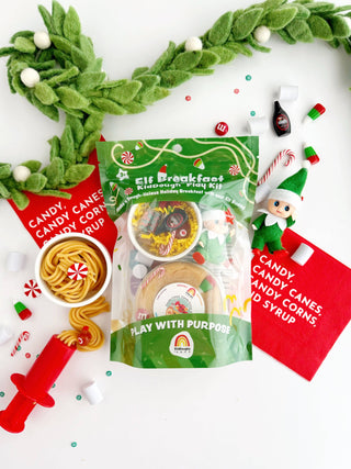 Elf Breakfast KidDough Play Kit green bag with elf figurine, yellow dough, and holiday candy accessories