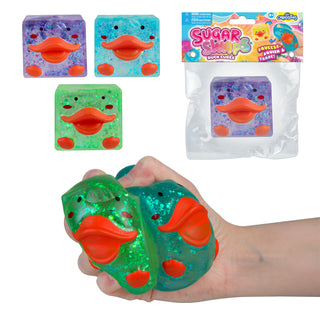 Glitter gel-filled squishy duck face cube toys in purple, blue, and green with orange beaks