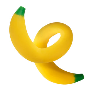 Yellow banana with green tips on a white background