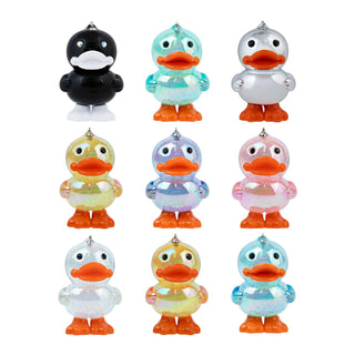Set of colorful duck-shaped ornaments on a white background