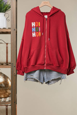 Mello red zip-up hoodie with colorful HoHoHo Christmas patch embroidery and hood